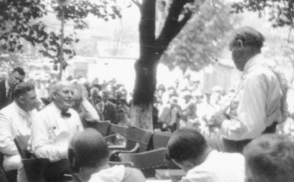 In this scene from the Scopes trial in Dayton TN in 1925, we see participants gathered on the lawn in front of the courthouse.