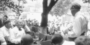 In this scene from the Scopes trial in Dayton TN in 1925, we see participants gathered on the lawn in front of the courthouse.